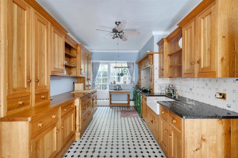 The kitchen looking towards the light of the morning room.